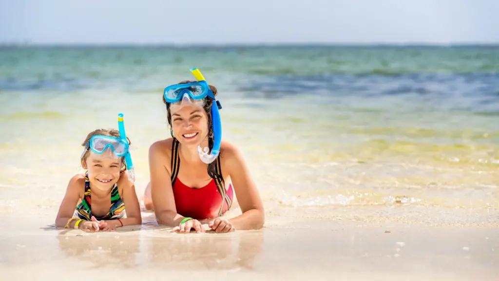 Mom And Child On Beach