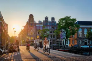 Amsterdam,,netherlands, ,may,20,,2018:,people,on,bicycles,on